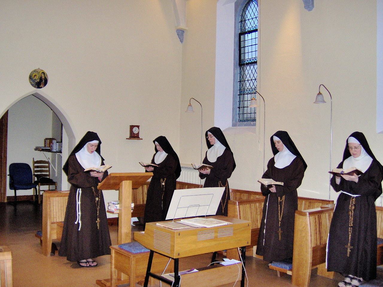 Sisters Chanting in the Chapel