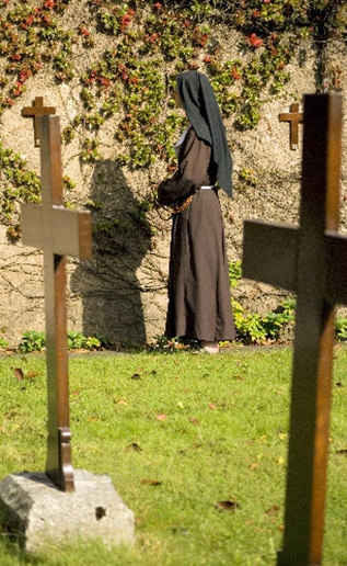 Praying in the Garden of the Monastery