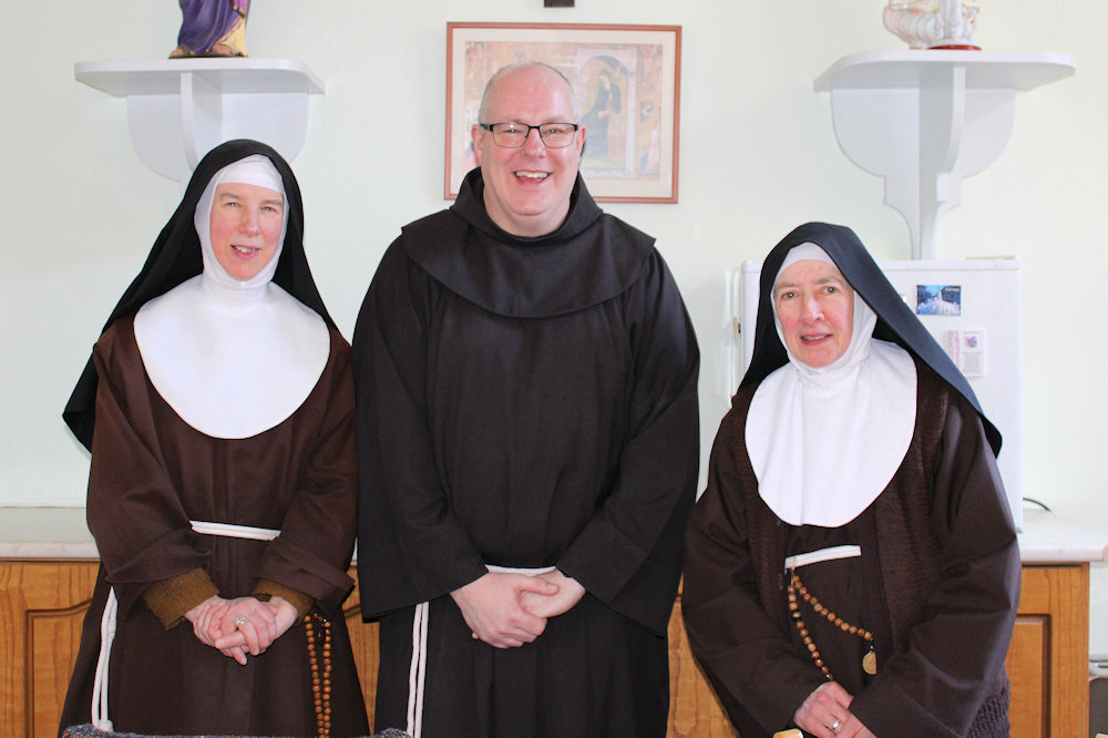 Here we see two of our Sisters with Fr Damian, all from Waterford, keeping the Waterford Franciscan flag flying!